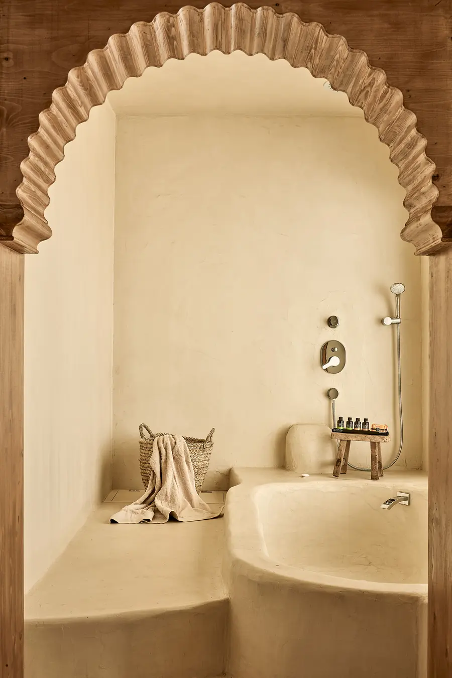 Naxian on the Beach: Bathtub beneath a textured arch