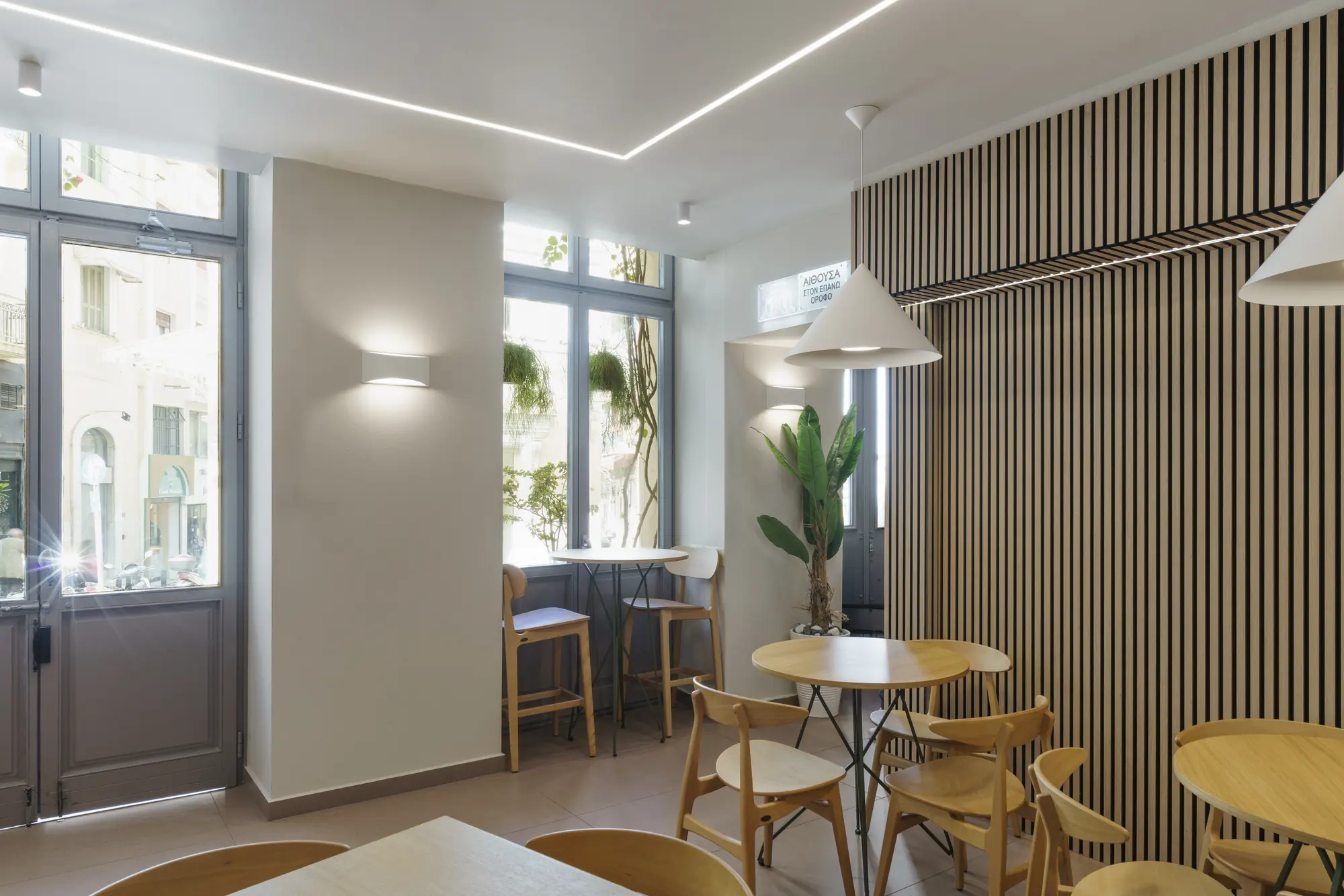 Tables in front of wooden slats