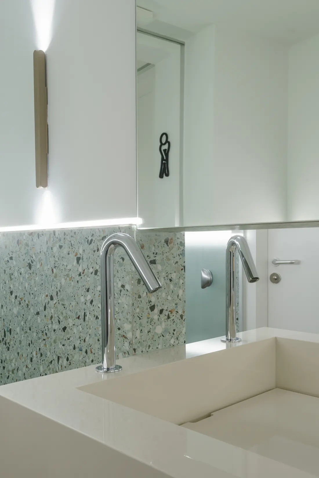 Basin clad in terrazzo