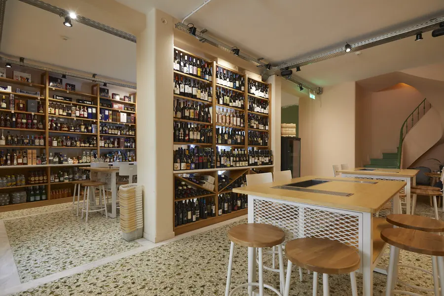 Warehouse Assemblage: High tasting table between the shelves